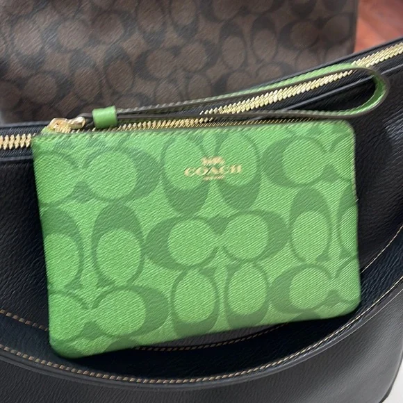 Coach Corner Zip Wristlet In Signature Canvas 
Im/Neon Green - Picture 13 of 16